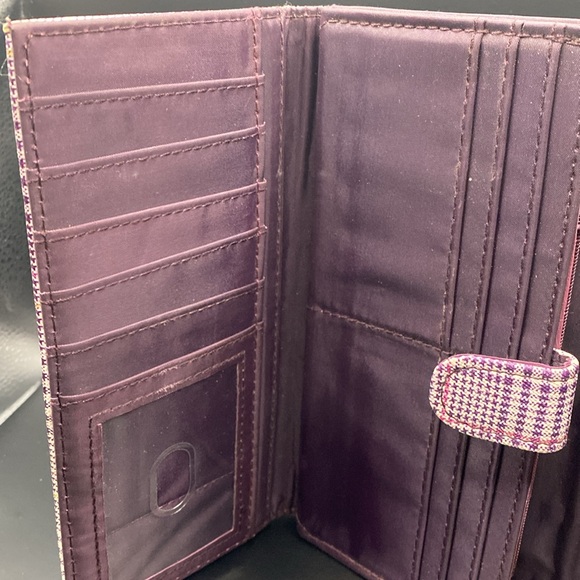 Super cute ladies wallet. All zippers and closures work as they should. - Picture 4 of 12